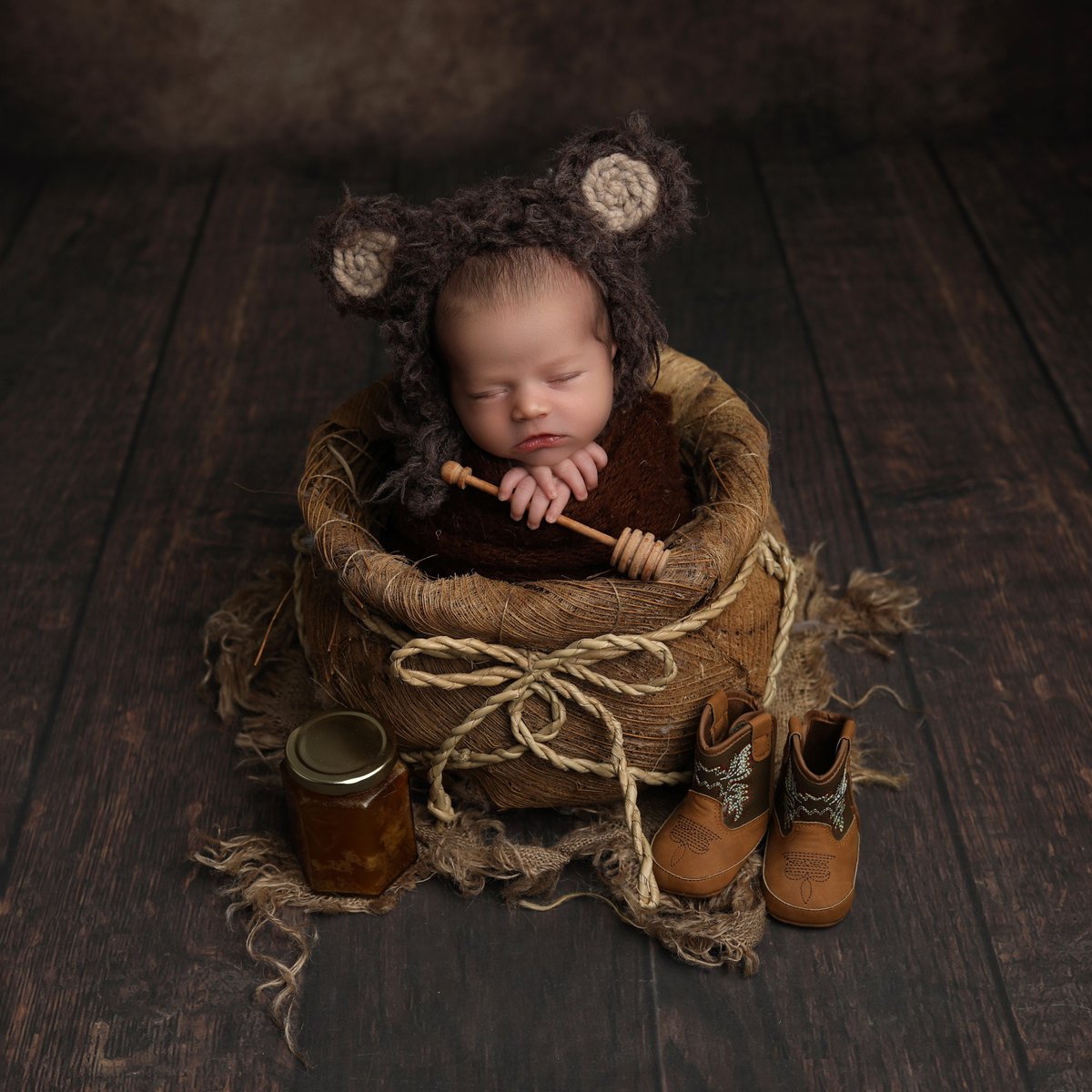 baby in honey pot for a professionally taken photograph
