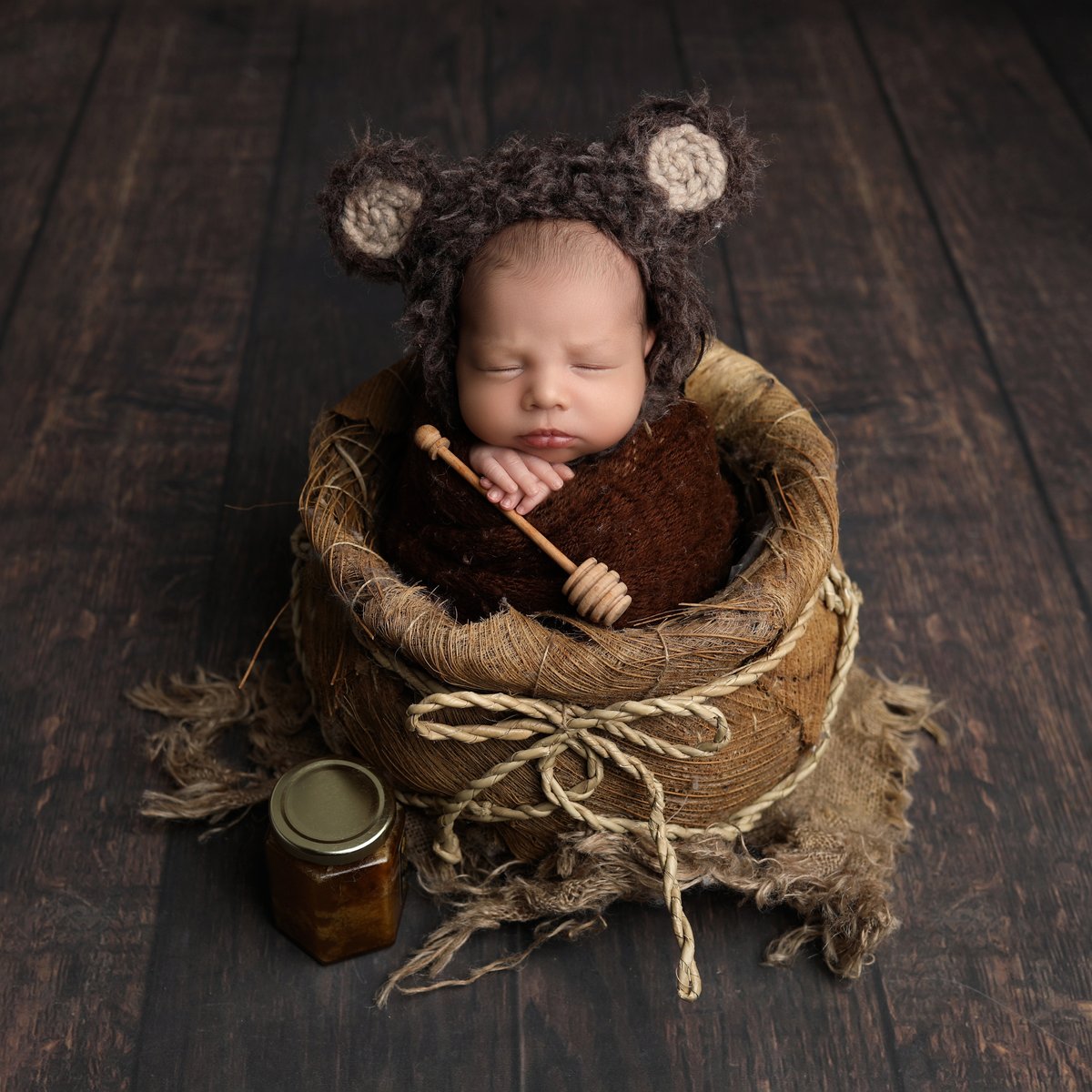 cute baby in  basket for a photoshoot