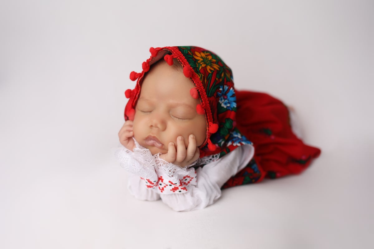 baby in cute dress posing for a high quality photo