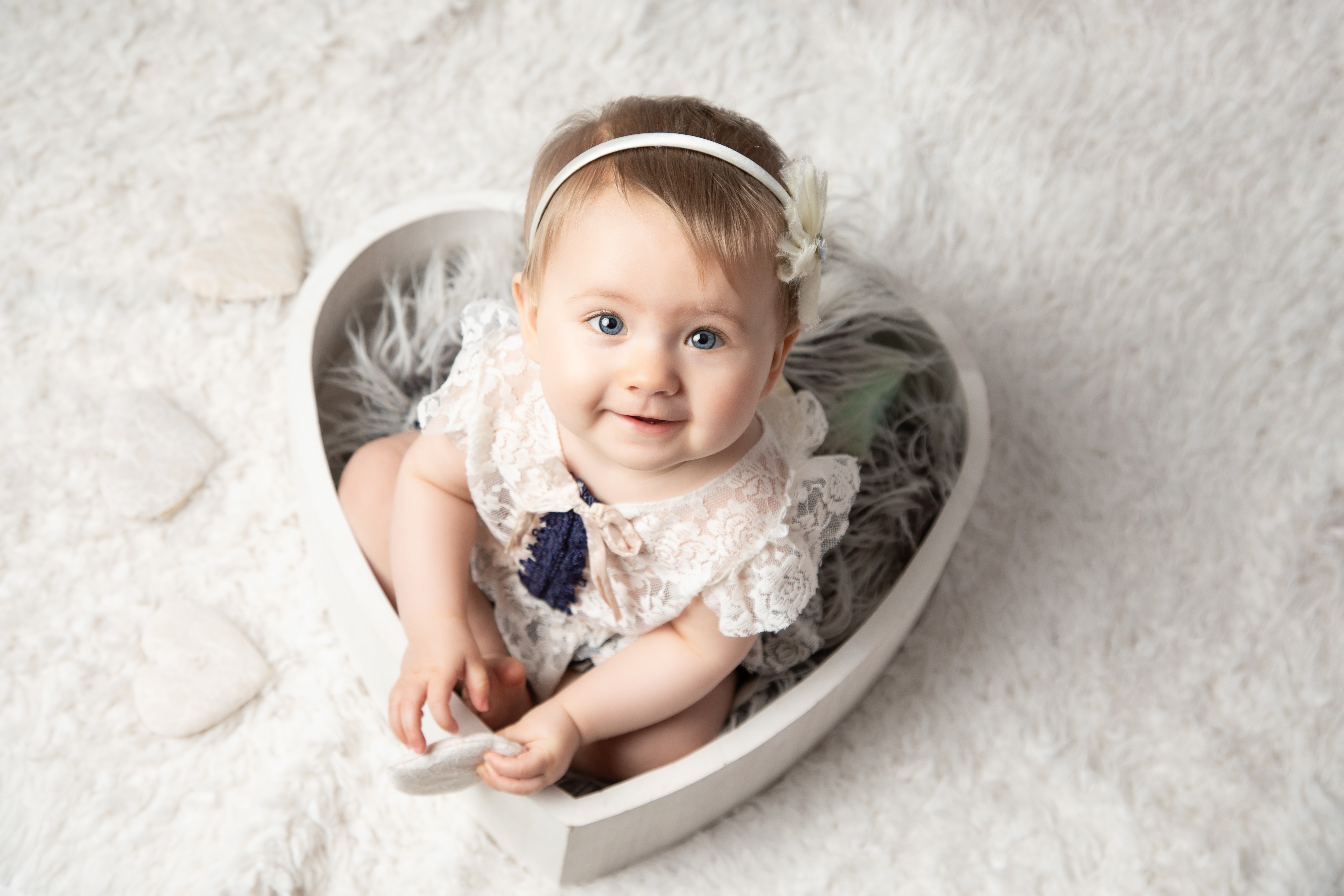 Photo of Baby in love heart box, taken by photographer in Edinburgh